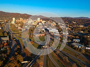 Downtown Asheville, North Carolina. Aerial drone view of the city in the Blue Ridge Mountains during Autumn / Fall Season.  Archit