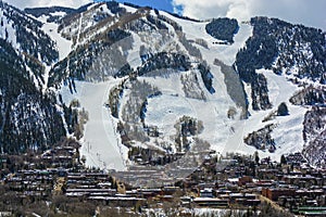 Downtown Aspen, Colorado in the Winter During the Day with the Mountains in the Background photo