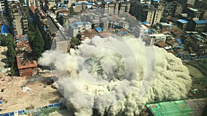 Downtown building demolition by implosion