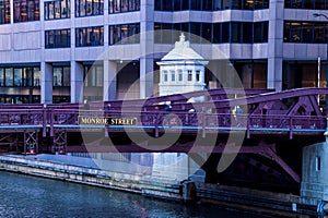 Downtown Chicago River view of bridges during commuter rush hour