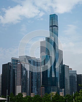 downtown chicago skyline of skyscrapers and tall buildings with blue sky in background