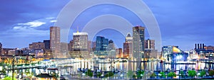 Downtown city skyline and Inner Harbor at night