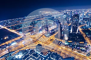 Downtown dubai futuristic city neon lights and sheik zayed road