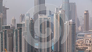 Downtown Dubai skyline with residential towers timelapse, view from rooftop.