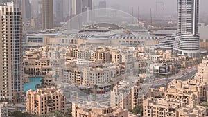 Downtown Dubai skyline with residential towers timelapse, view from rooftop.