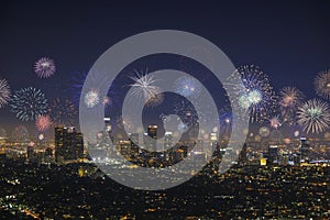 Downtown Los Angeles Cityscape with exploding fireworks during New Years Eve