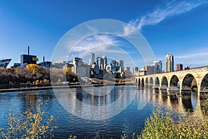 Downtown Minneapolis, Minnesota as seen from the famous stone arch bridge