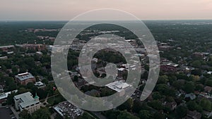 Downtown Naperville in evening time. Wide Aerial Drone footage