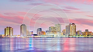 Downtown New Orleans, Louisiana and the Mississippi River at twilight