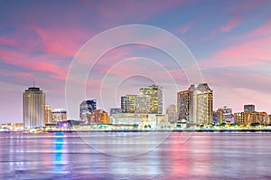 Downtown New Orleans, Louisiana and the Mississippi River at twilight