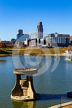 Lake and fountain and surrounding downtown building Heartlabd of America Park Omaha. photo
