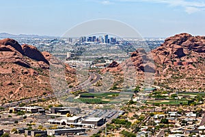 Downtown Phoenix aerial view from between the the Papago Buttes photo