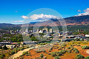 Downtown Reno skyline, Nevada, with hotels, casinos and surrounding mountains photo