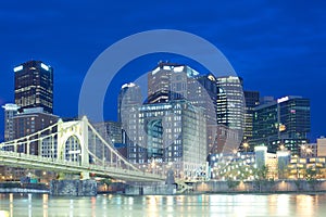 Downtown skyline and Roberto Clemente Bridge over Allegheny River, Pittsburgh. photo