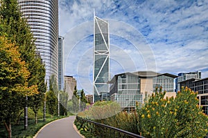 Downtown skyscrapers, trees and a path, park in SOMA, San Francisco, California photo