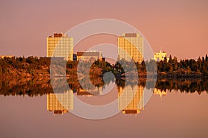 Downtown Yellowknife Buildings reflected in Frame Lake in Evening Light, Northwest Territories, Canada