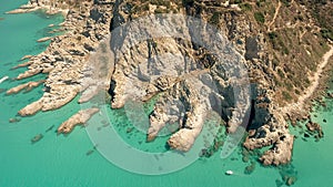 Downward aerial view of beautiful southern italian coastline. Capo Vaticano, Calabria. Overhead panorama in summer