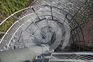 Downward Spiral, Spiral staircase in old town in Warsaw, Poland