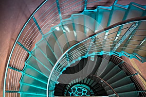 Downward spiraling staircase photo