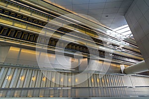 Downward View of Stairs and Escalators in a Modern Building