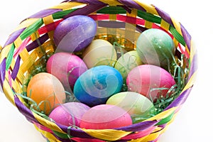 A Dozen Easter Eggs in an Easter Basket photo