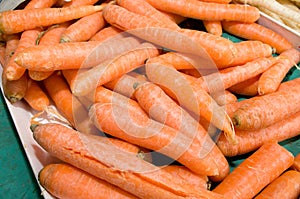 Dozens of carrot randomly piled up