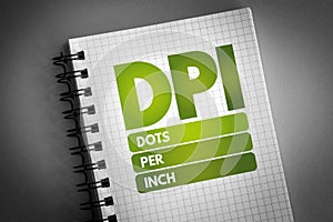 DPI - Dots Per Inch acronym on notepad, technology concept background