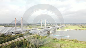 Dr. W. Hupkesbrug and Martinus Nijhoffbrug aerial drone view highway infrastructure bridge over a large waterway in The