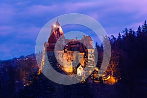 Dracula Castle with lights at night in Romania