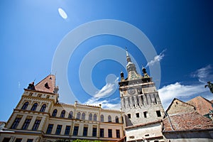 Dracula\'s house and The clock tower in the night time, Historic Centre of Sighisoara, Transylvania region in Romania