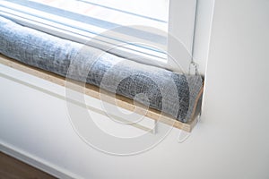 Draft Excluder Under Window Blocking Cold Air