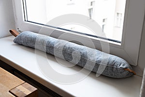 Draft Excluder Under Window