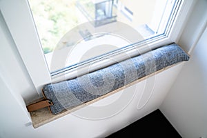 Draft Excluder Under Window Blocking Cold Air