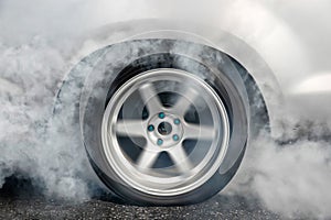 Drag racing car burn tire for the race.