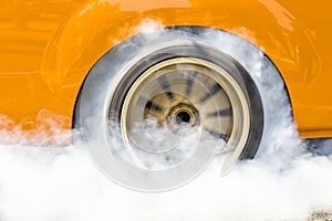 Drag racing car burning tire for the race photo