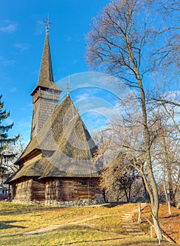 The Dragomiresti wooden church in village museum, Bucharest, Romania photo