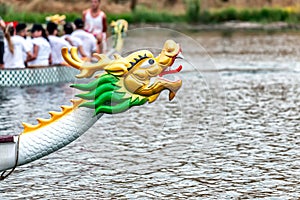 Dragon boat competition. Close-up of a boat`s head