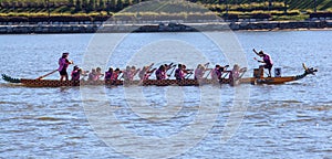 Dragon Boat Paddlers in Race