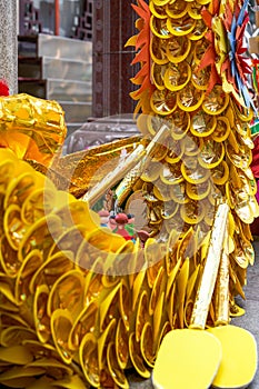 Dragon boat tied with golden paper, characteristic of Guangxi Zhuang, a Chinese minority