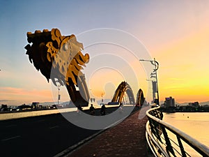 Dragon bridge landmark of Danang City, Vietnam on sunset scene