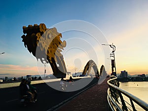 Dragon bridge landmark of Danang City, Vietnam on sunset scene