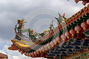 Dragon and Crane Sculpture on Chinese Temple Roof