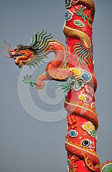 Dragon decorated at the column of Chinese shrine in Thailand