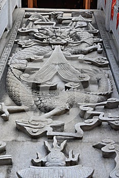 Dragon embossment on the steps to a buddha's hall