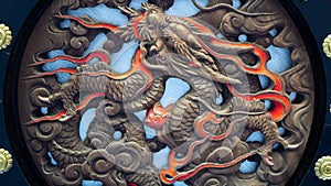 Dragon engraving at the base of a giant paper lantern in Kaminarimon - thunder gate of Sensoji temple in Asakusa