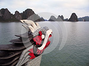 Dragon figurehead on Halong Bay photo