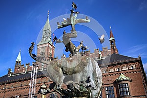 Dragon fountain and Radhus, Copenhagen city hall in Copenhagen