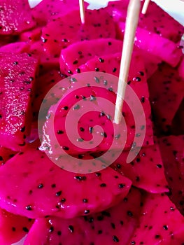 dragon fruit is dark red with a very sweet taste and is believed to reduce fever