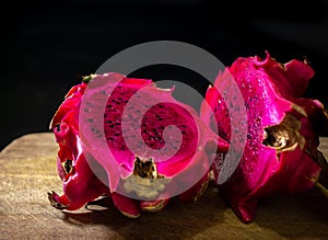 Dragon fruit,  name used since around 1993, apparently resulting from the leather-like skin and prominent scaly spikes on the frui