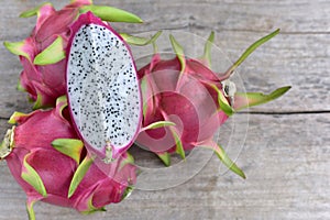 Dragon fruit on old wood background Healthy fruits. top view